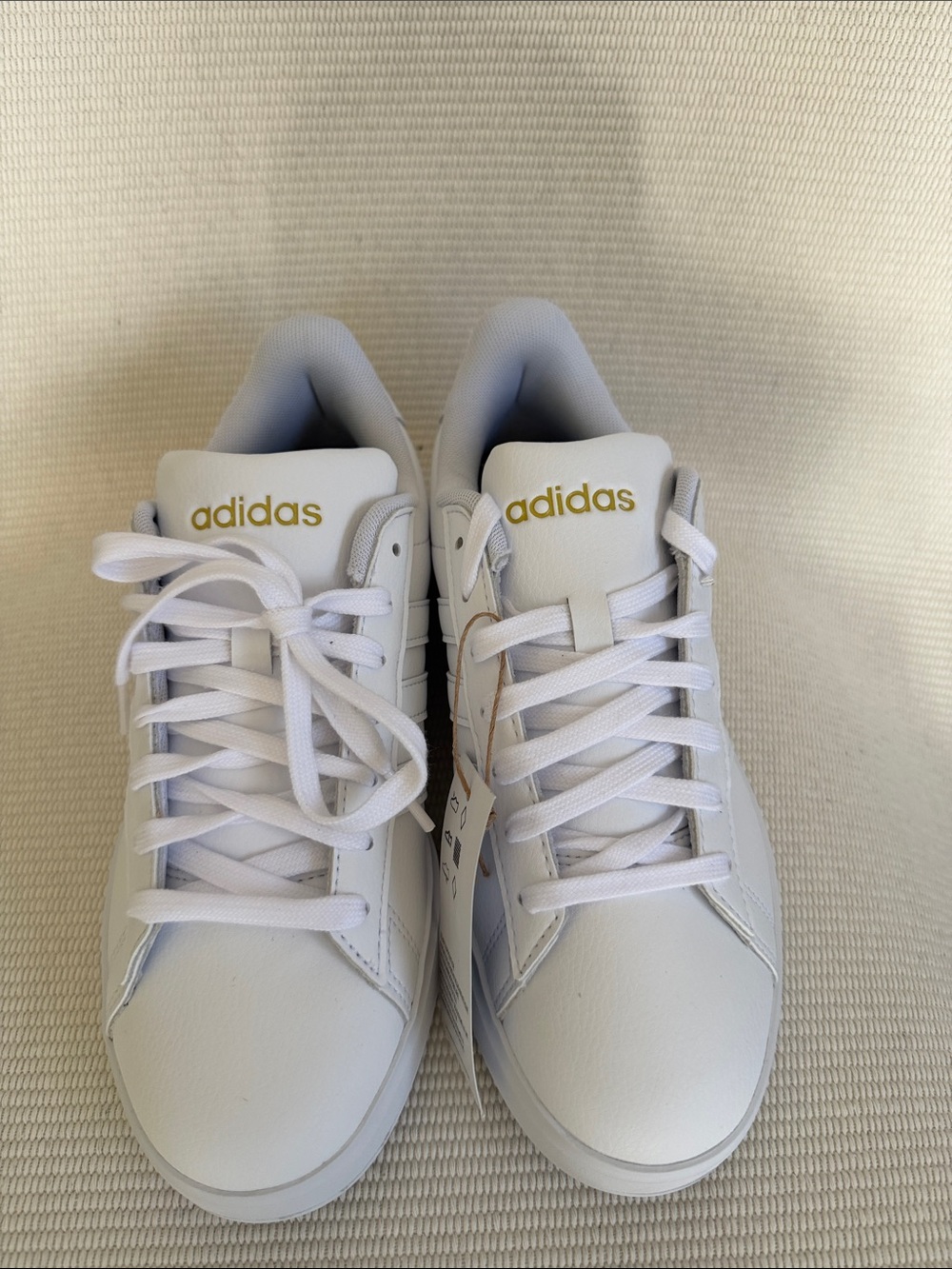 adidas Women’s  White Sneakers with Gold Branding